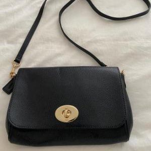 Coach cross body bag with removable cross body strap and chain for hand carry